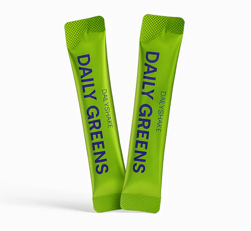 Two green packets of 'Daily Greens' on a white background